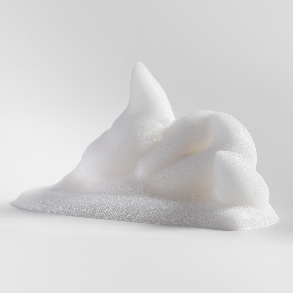 Modellierender Styling-Schaum für Locken Modellierender Styling-Schaum für Locken